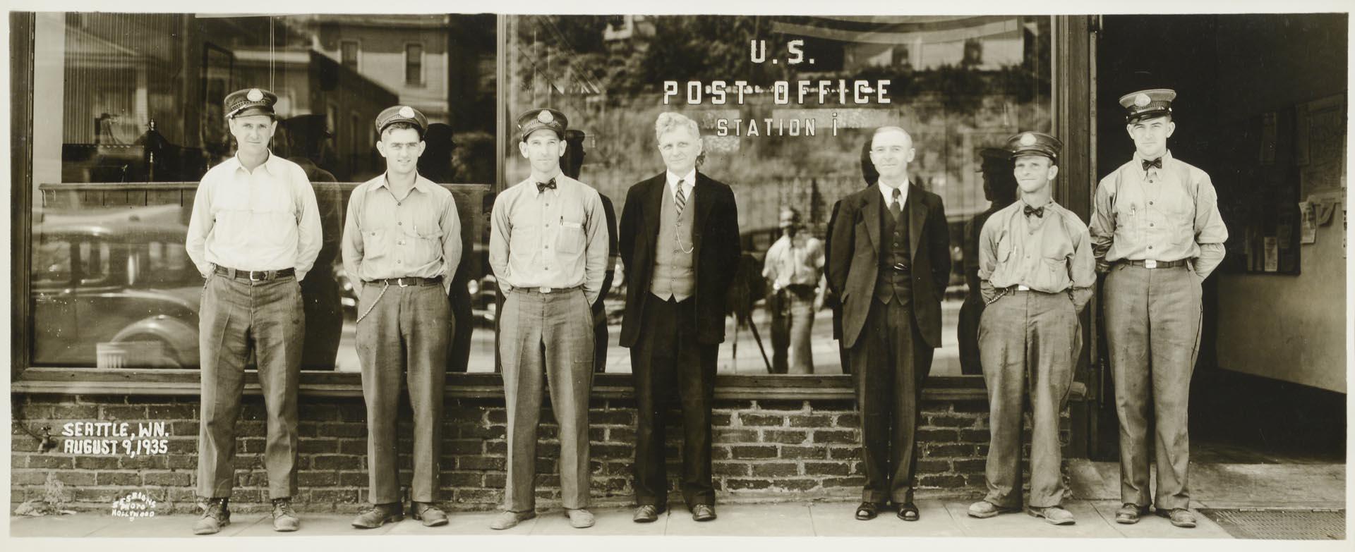 Image of U.S. Post office employees in front of Interbay Station, Seattle, August 9, 1935