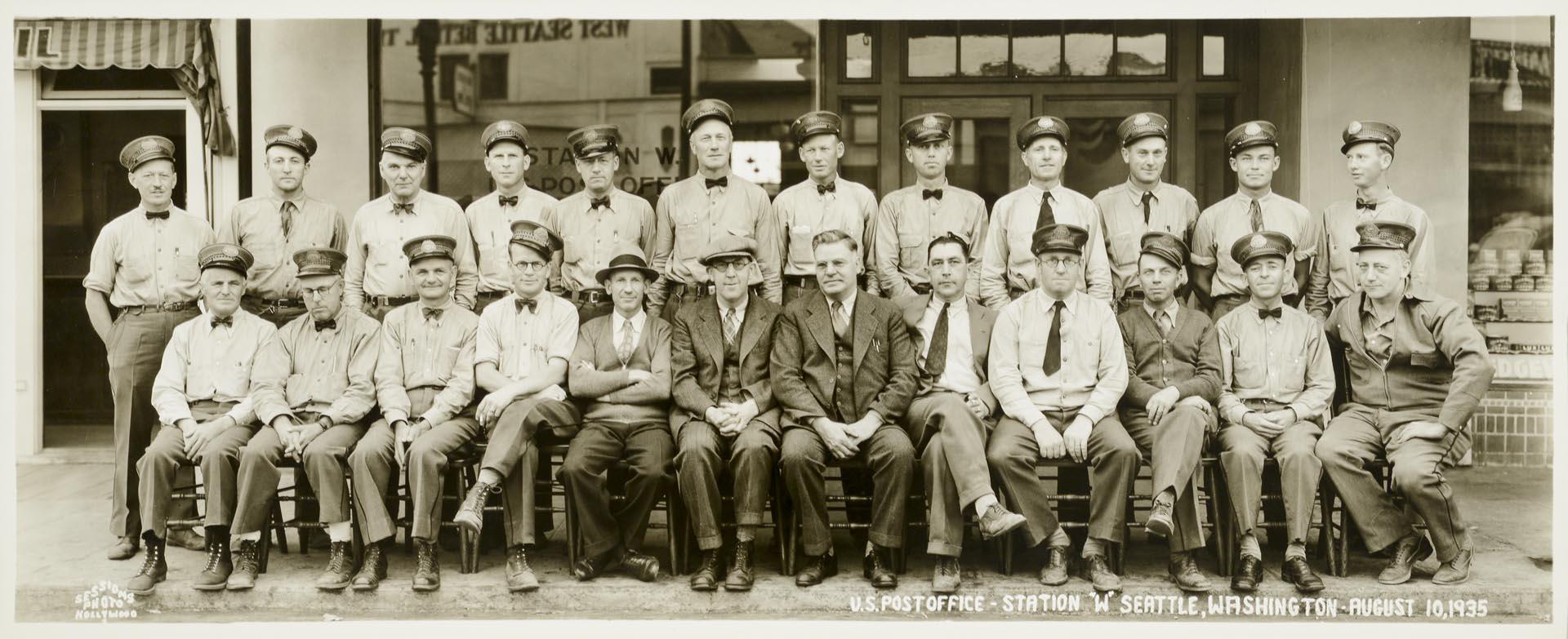 Image of U.S. Post office employees in front of West Seattle Station, August 10, 1935