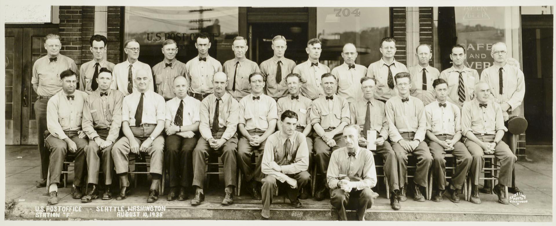 Image of U.S. Post office employees in front of Fremont Station, Seattle, August 10, 1935