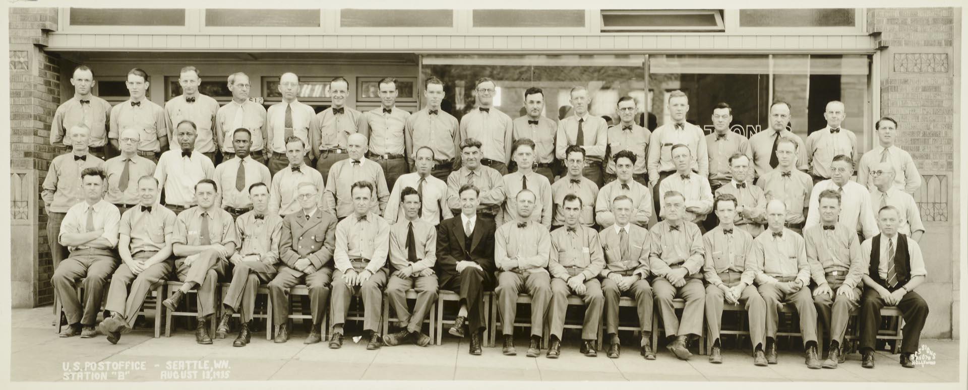 Image of U.S. Post office employees in front of Broadway Station, Seattle, August 13, 1935
