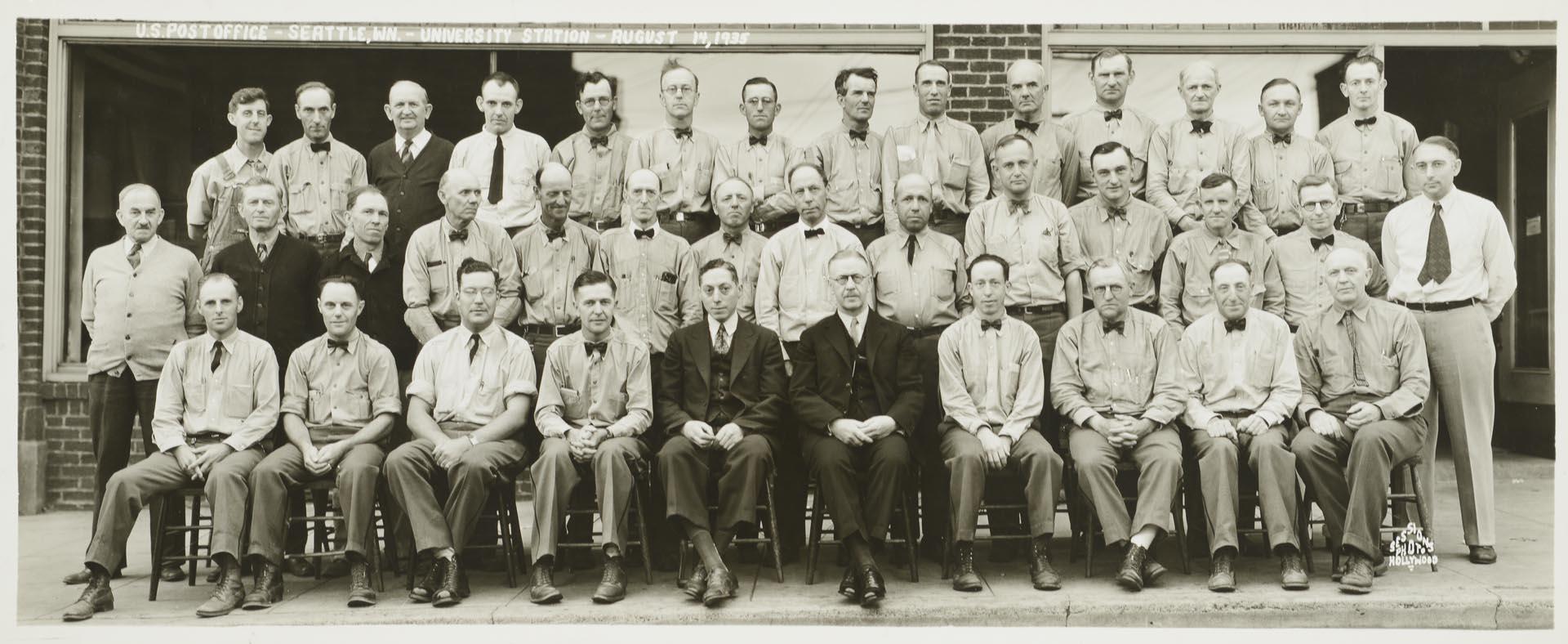 Image of U.S. Post office employees in front of University Station, Seattle, August 14, 1935