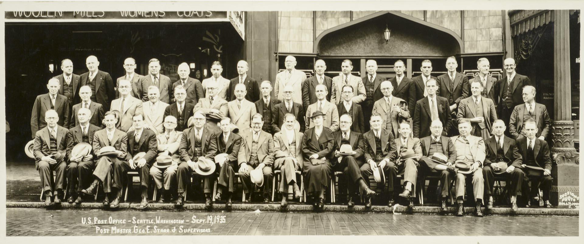 Image of Postmaster and employees in front of Federal Building, Seattle September 19, 1935