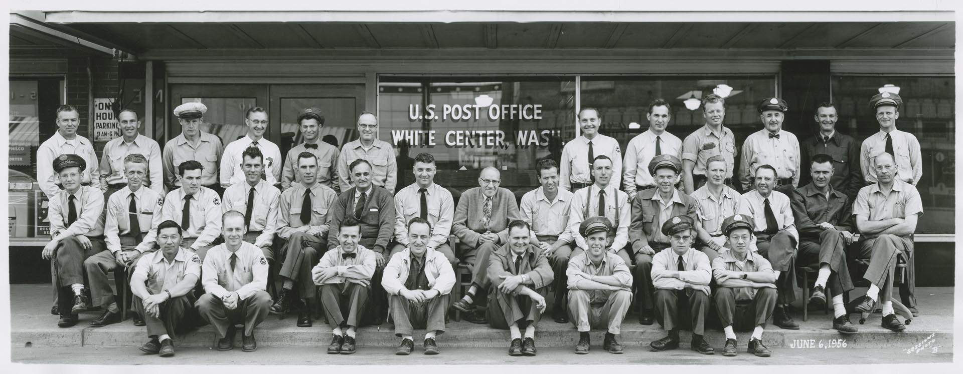 Image of U.S. Post office employees in front of White Center Station, Seattle, June 6, 1956