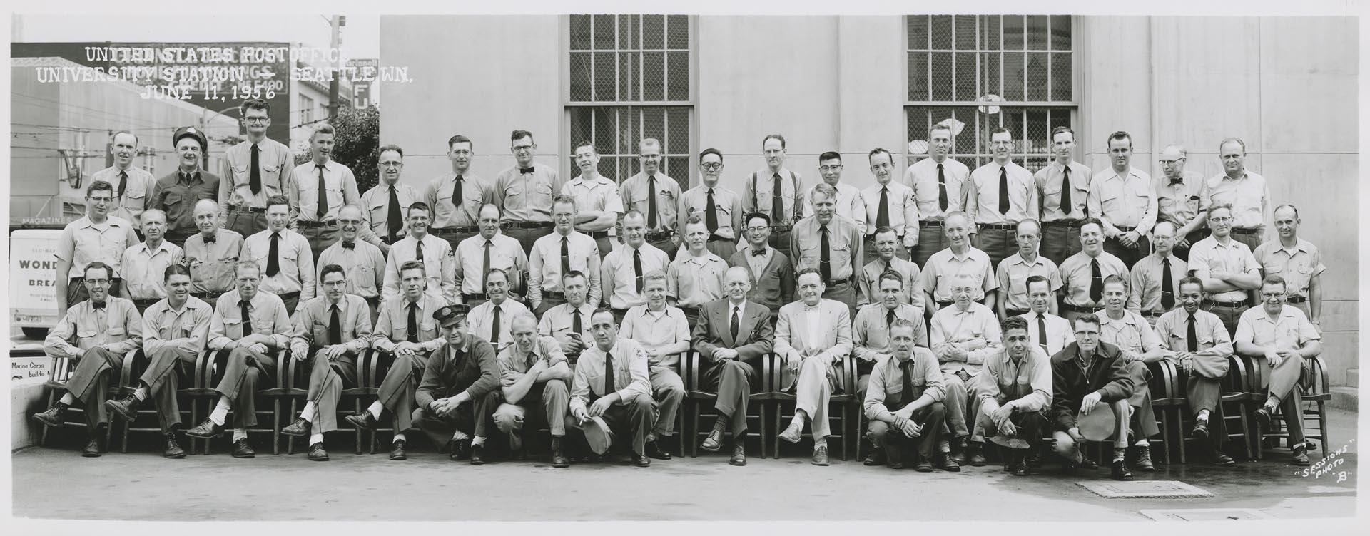 Image of U.S. Post office employees in front of University Station, Seattle, June 11, 1956