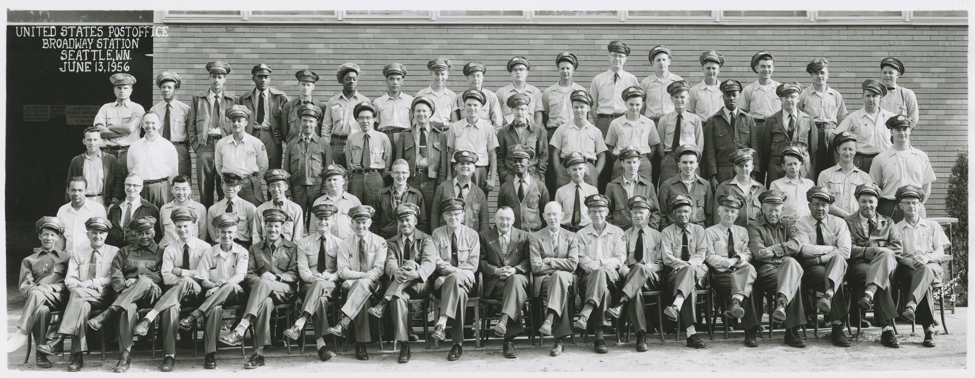 Image of U.S. Post office employees in front of Broadway Station, Seattle, June 13, 1956