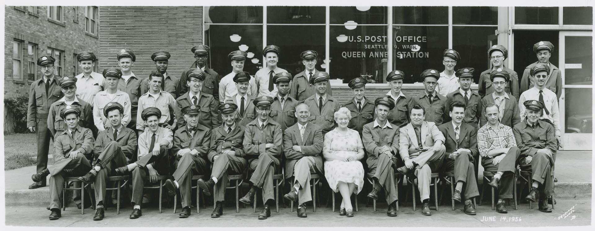 Image of U.S. Post office employees in front of Queen Anne Station, Seattle, June 1956