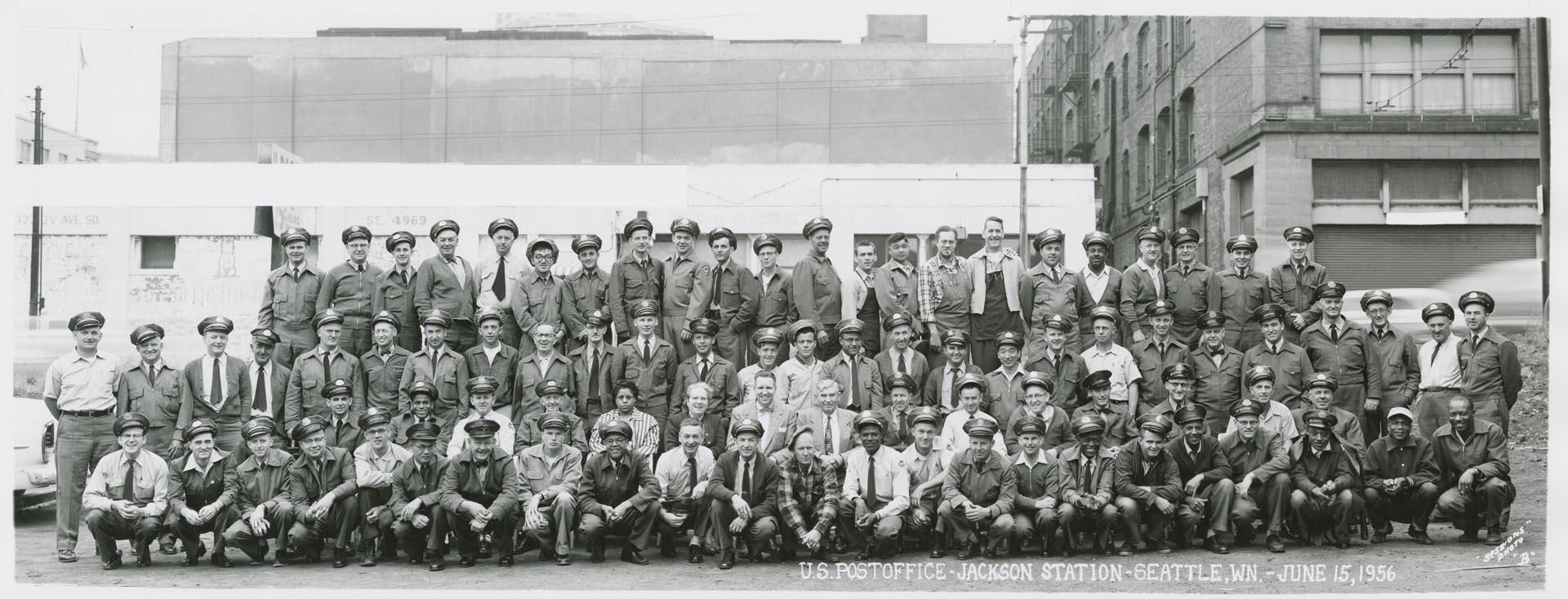 Image of U.S. Post office employees in front of Jackson Station, Seattle, June 1956