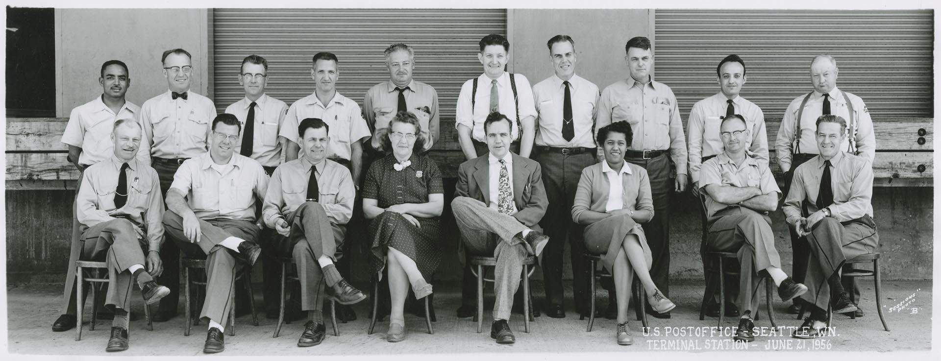 Image of U.S. Post office employees in front of  Terminal Station, Seattle, June 1956