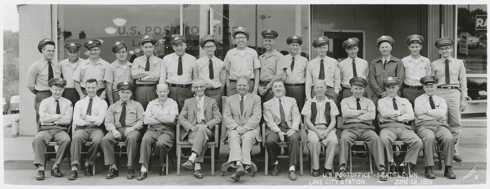 Image of U.S. Post office employees in front of Lake City Station, Seattle, June 1956