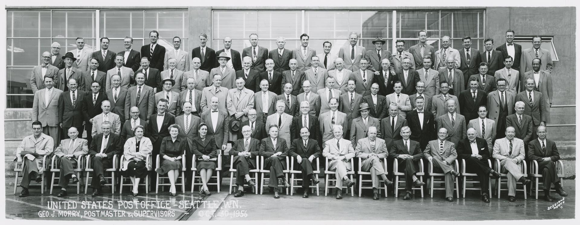 Image of Postmaster George Morry and post office supervisors, Seattle, October 30, 1956
