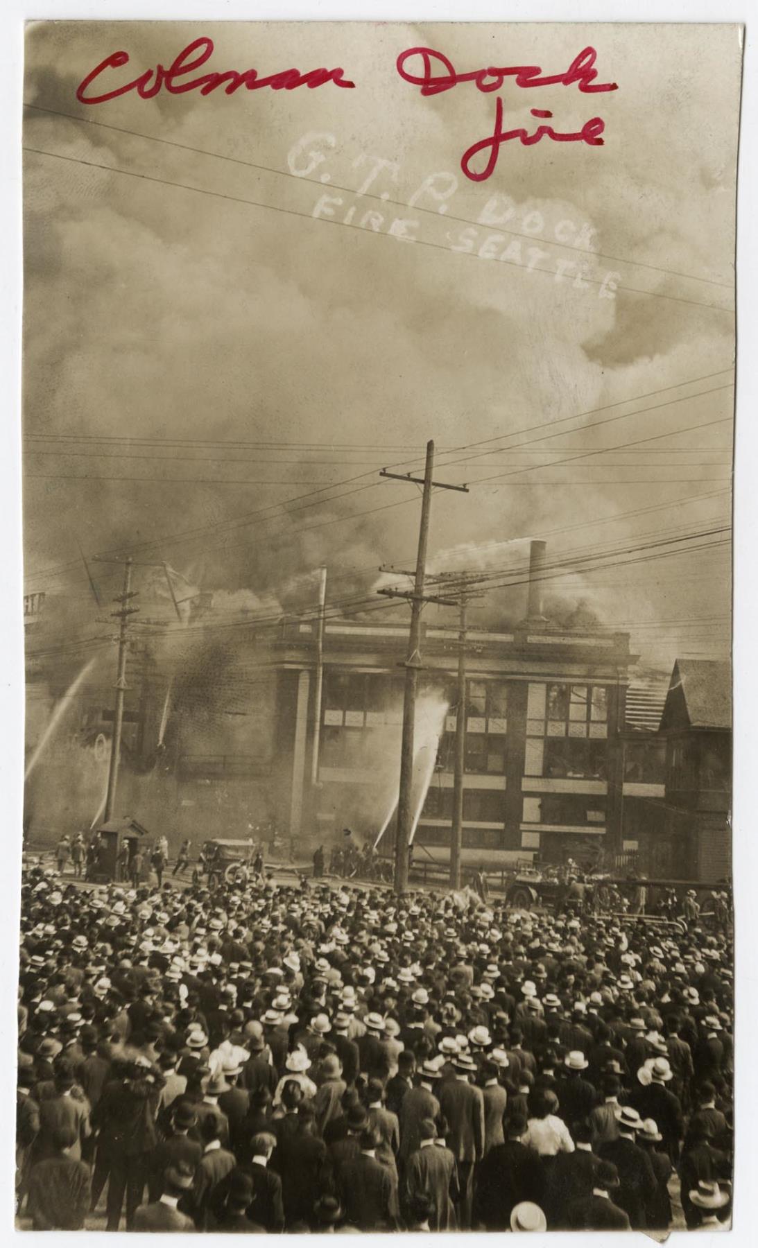 Image of Crowds watching fire at Grand Trunk Pacific pier, Seattle, July 30, 1914