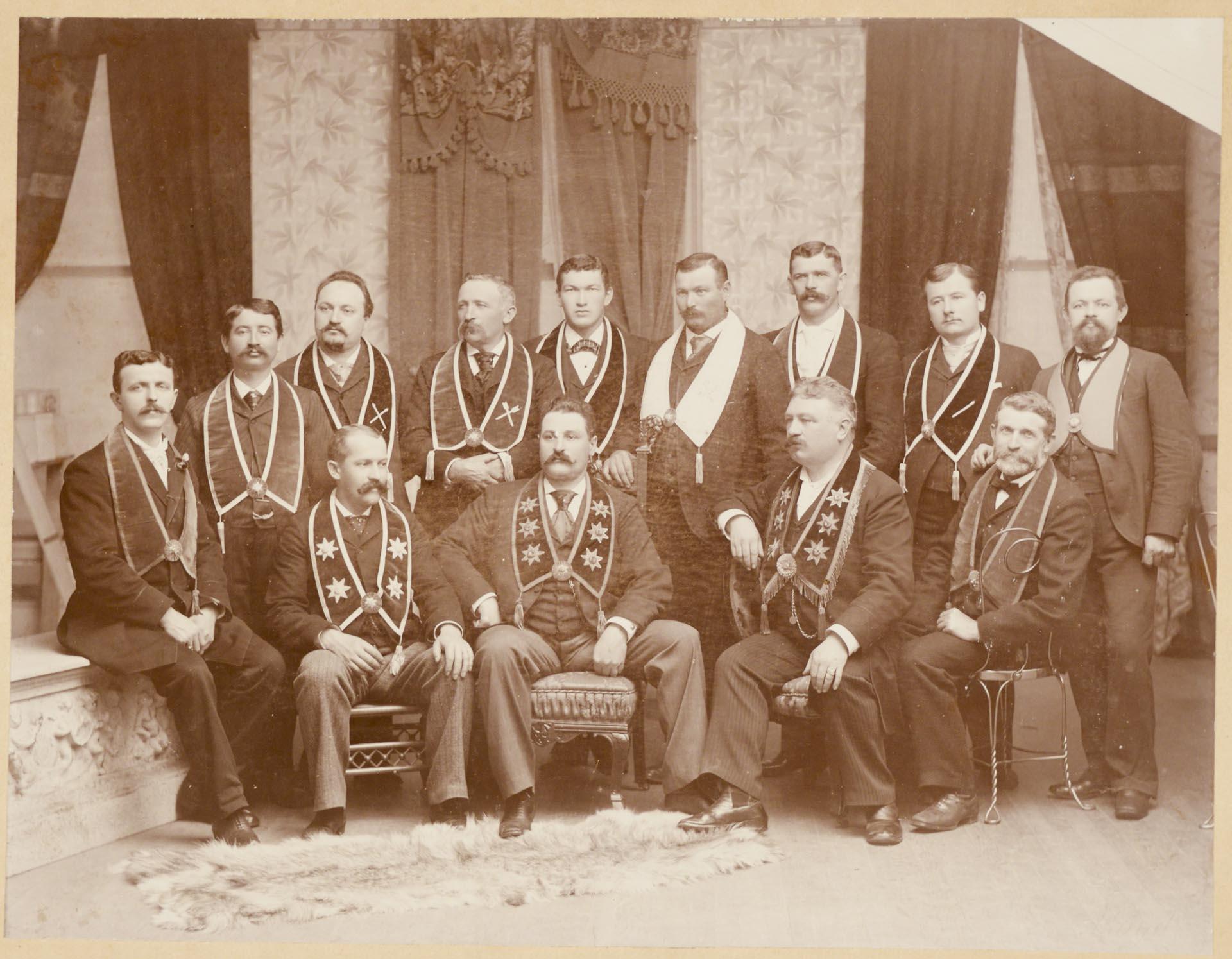 Image of Sons of Herman Lodge members posing in studio, Seattle, circa 1904