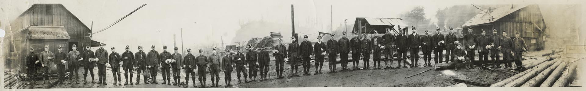Image of Coal miners posing on the surface at Ravensdale mine, circa 1910