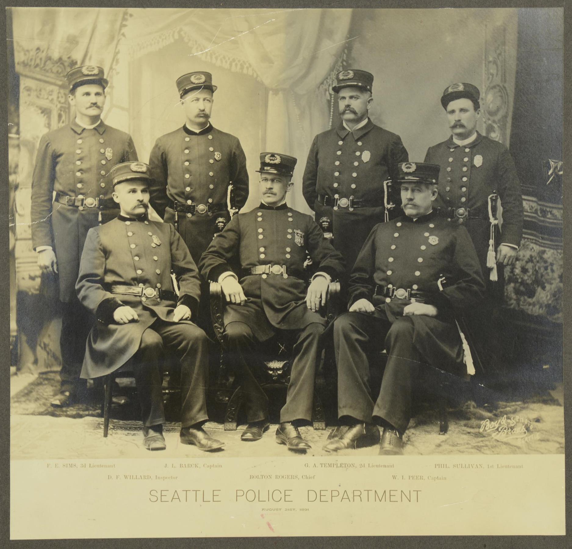 Image of Seattle Police Department officers sitting for portrait, August 21, 1891