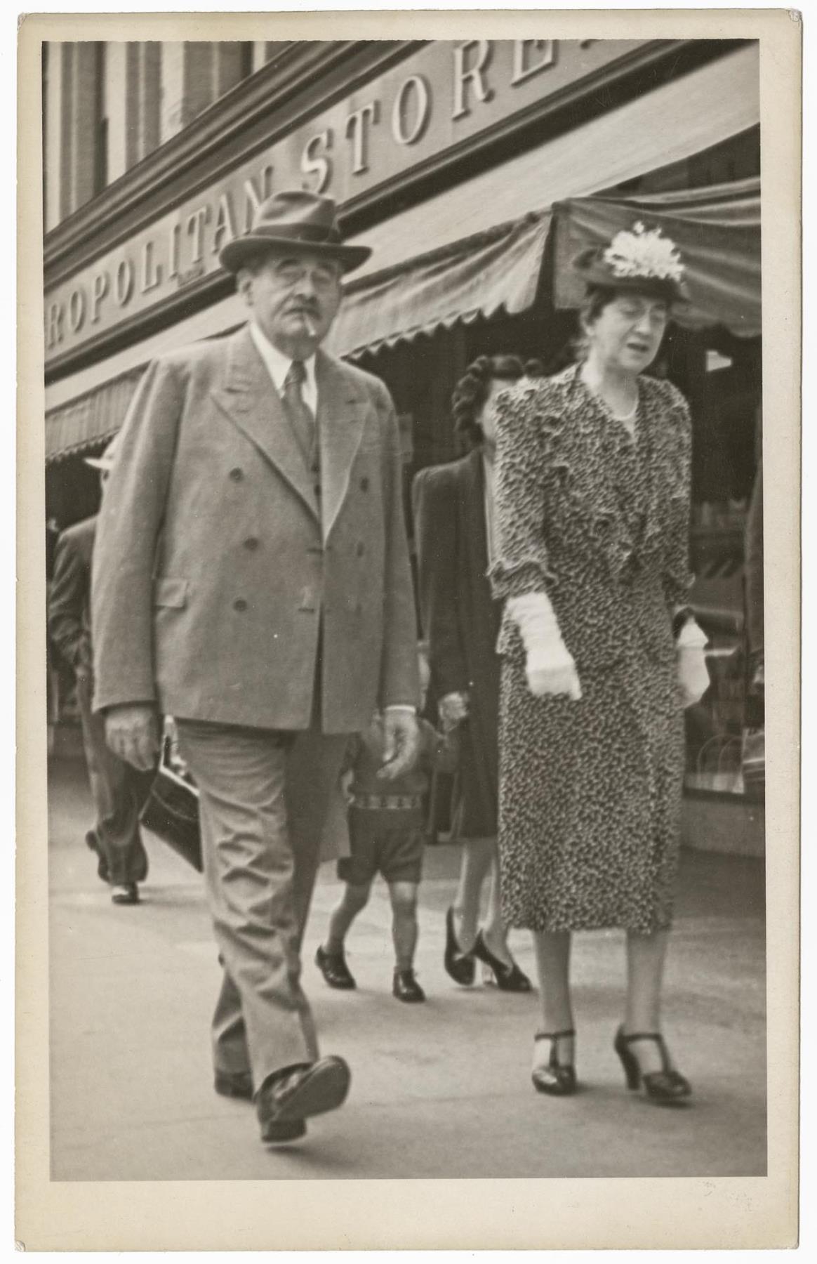 Image of Mina and Nathan Eckstein walking down street in Victoria, circa 1942