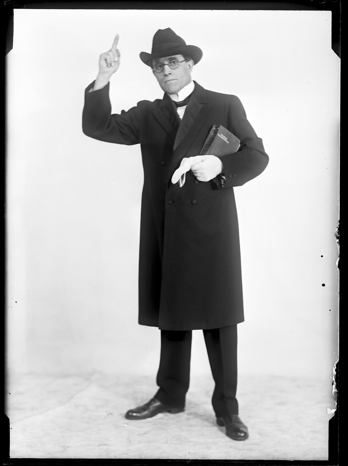 Image of Mayor Doc Brown posing dressed as a preacher, Seattle, 1925