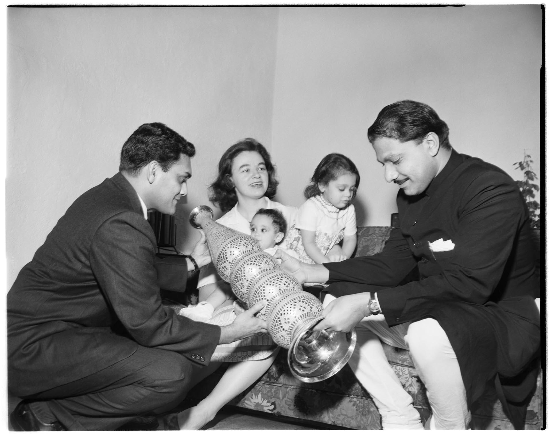 Image of Rajanikant “Raj” and Irene Joshi with their daughters and an unidentified man, February 1965