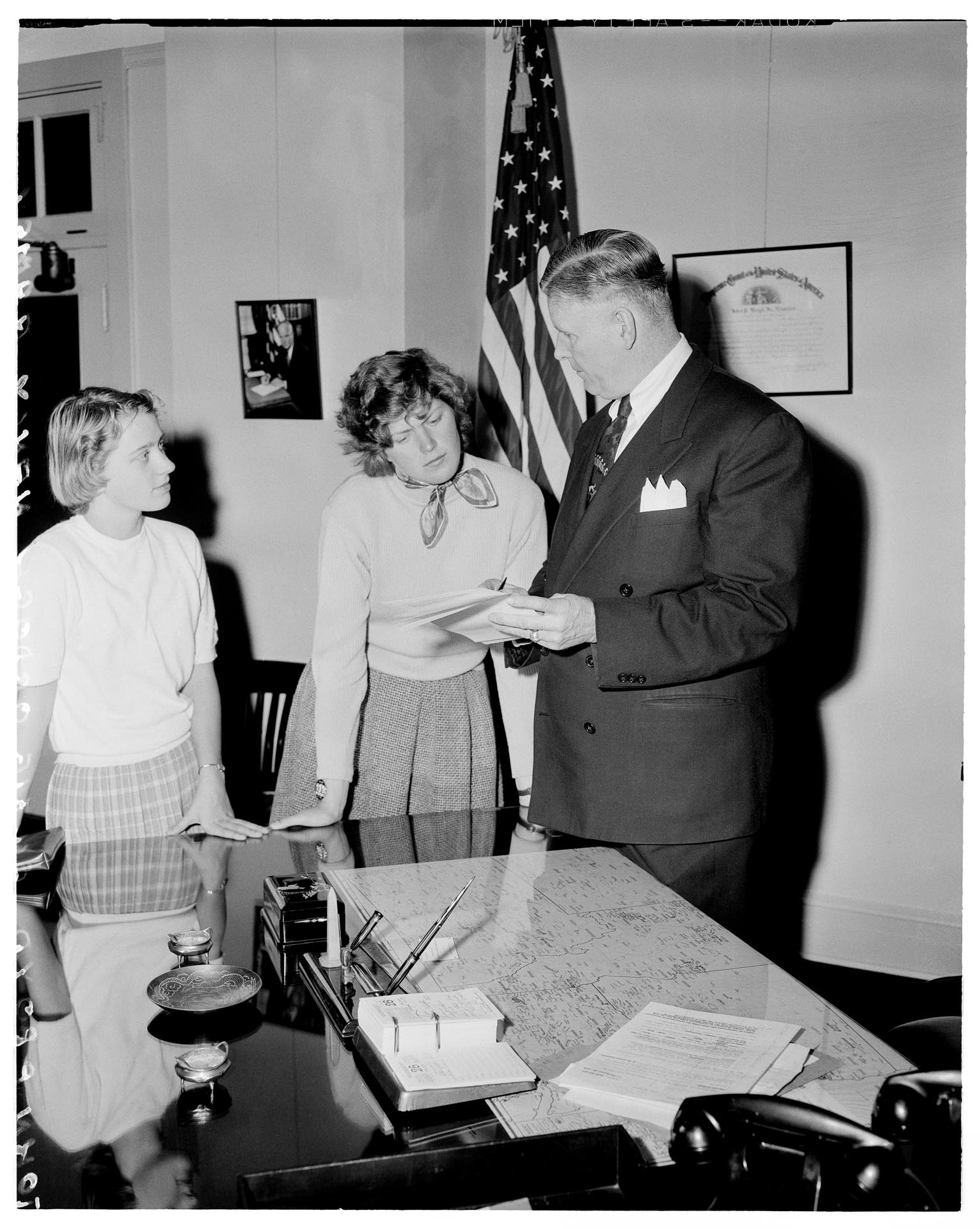 Image of Suzie Ordogh and John Boyd reading her order of parole, Seattle, December 26, 1956