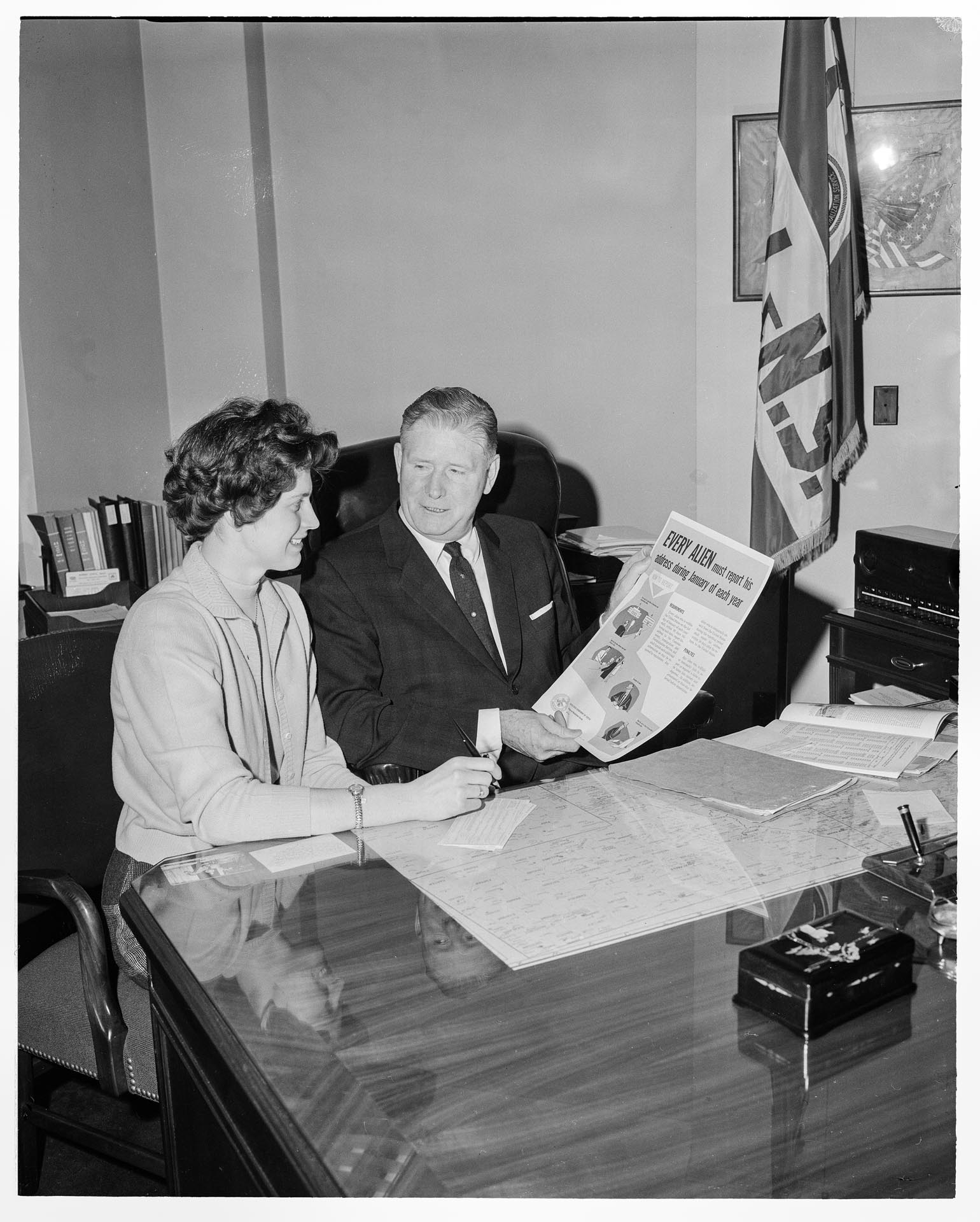 Image of Suzie Ordogh completing Alien Address report with John Boyd, Seattle, January 4, 1962