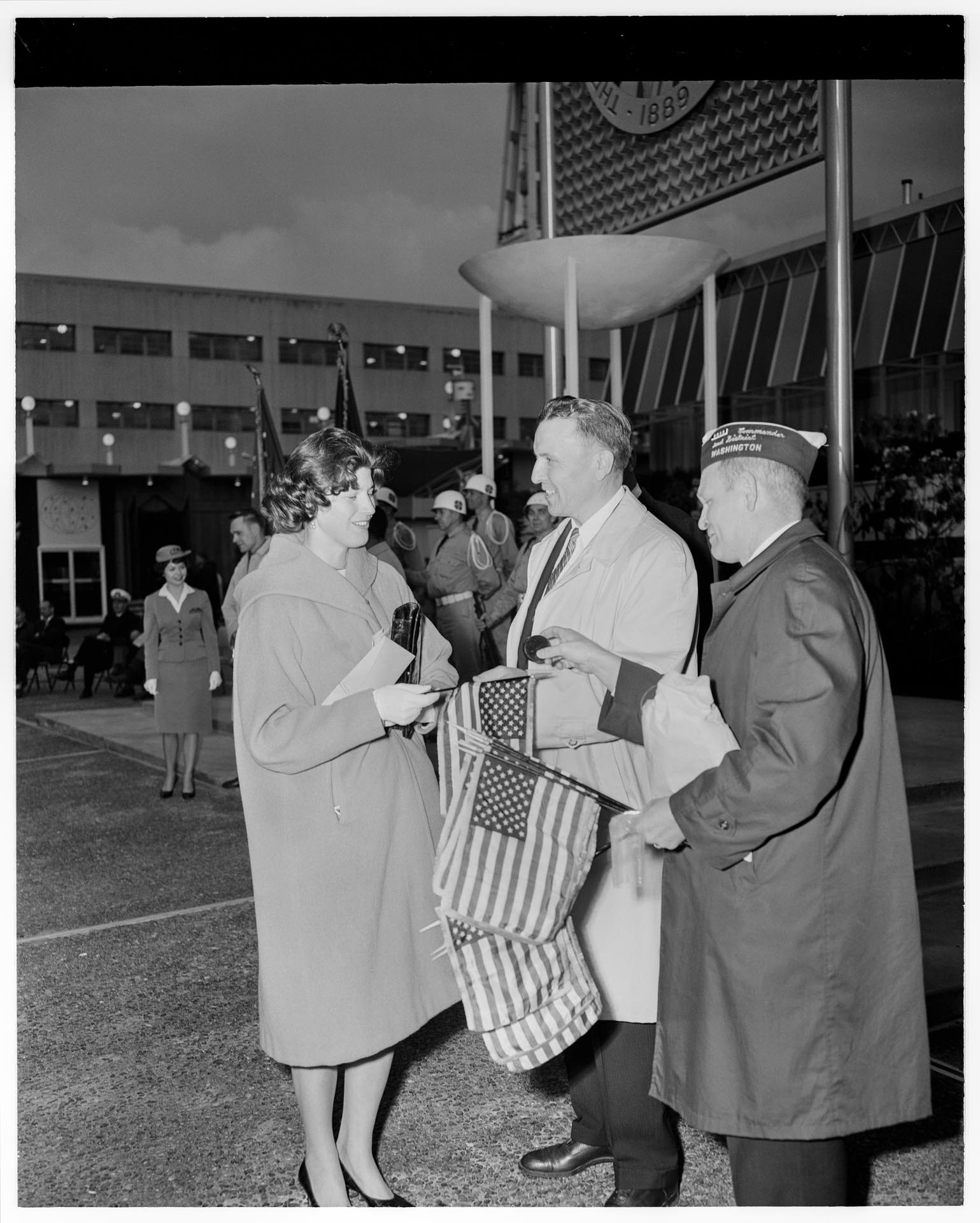 Image of Suzie Ordogh socializing after naturalization ceremony at courthouse, Seattle, April 23, 1962