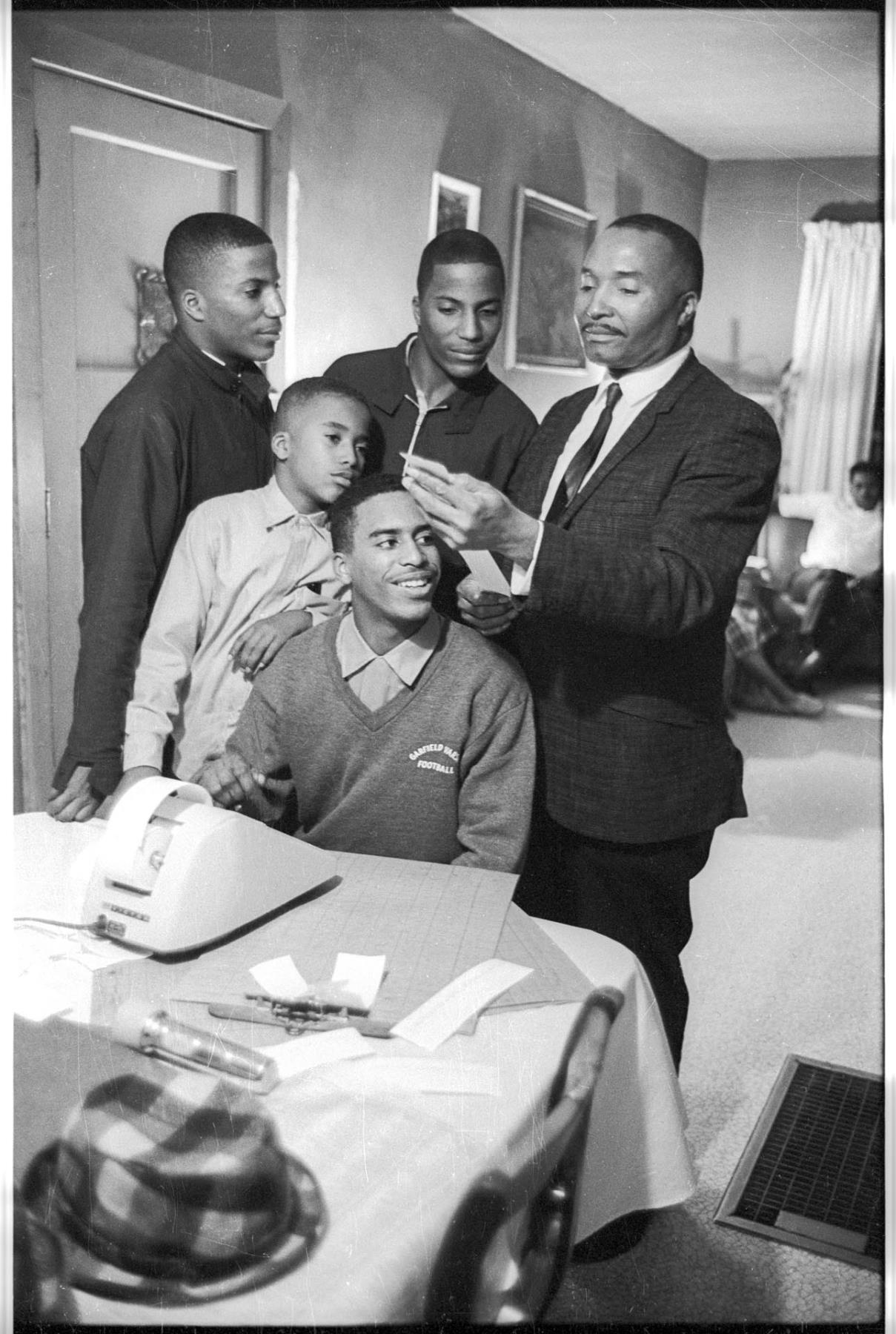Image of Sam Smith and his sons, November 7, 1967