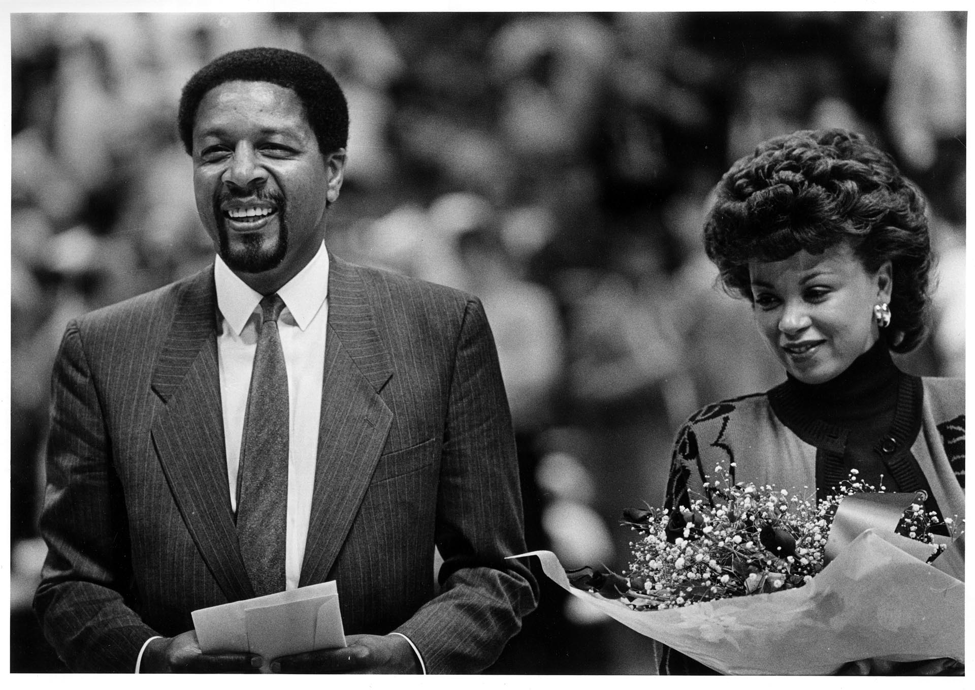 Image of Fred and Linda Brown in Kingdome at jersey-retirement ceremony, Seattle November 1986
