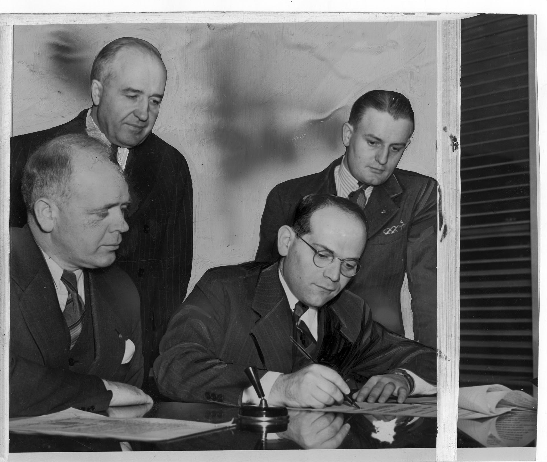Image of Jesse Epstein signing off on Yesler Terrace project, February 27, 1941