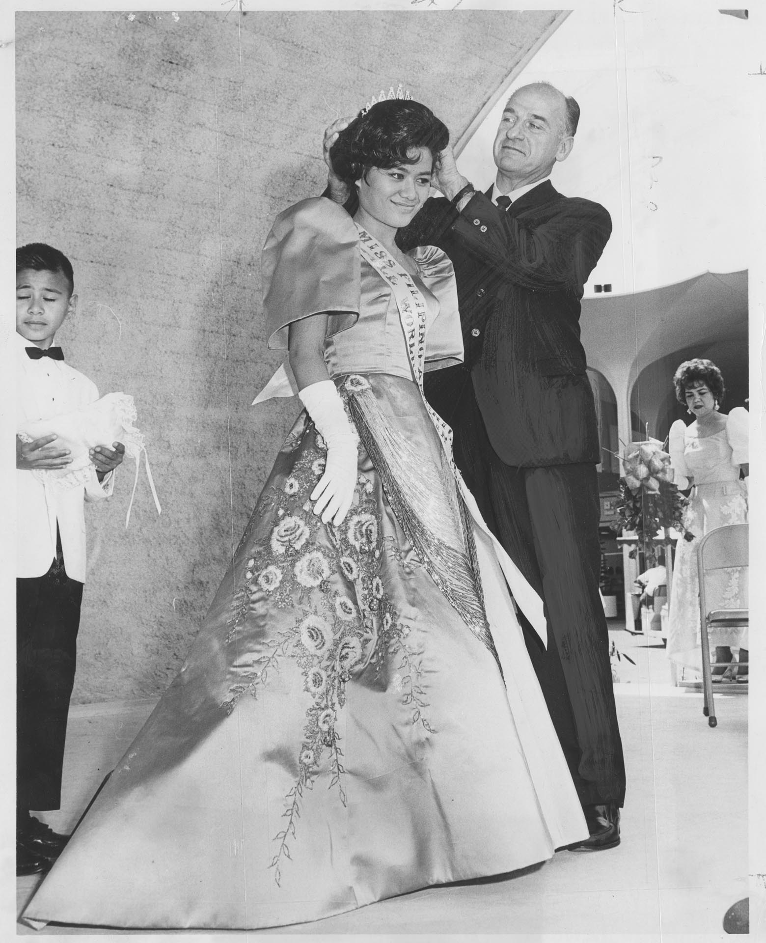 Image of Phebe Porras receiving the Miss Filipina American tiara at Seattle World's Fair, July 7, 1962