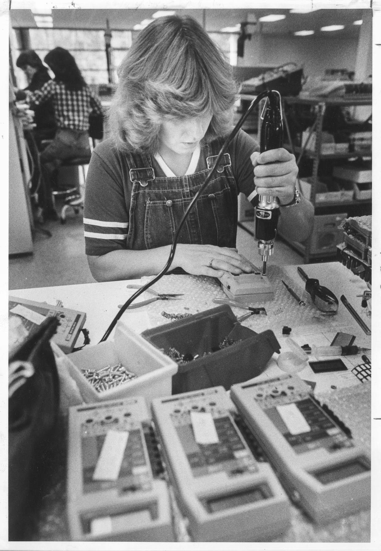 Image of Woman working on digital meters at Fluke Manufacturing, Everett, October 29, 1981
