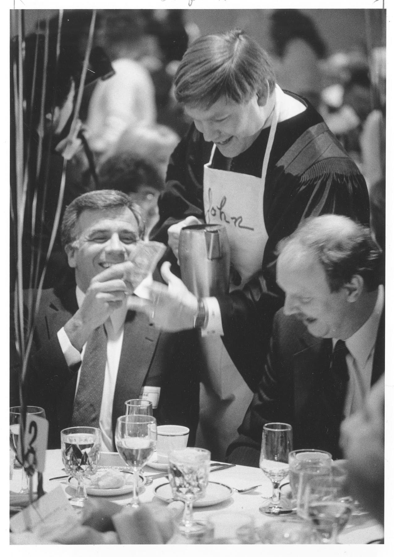 Image of John Fluke Jr. waiting table at charity luncheon, March 27, 1985