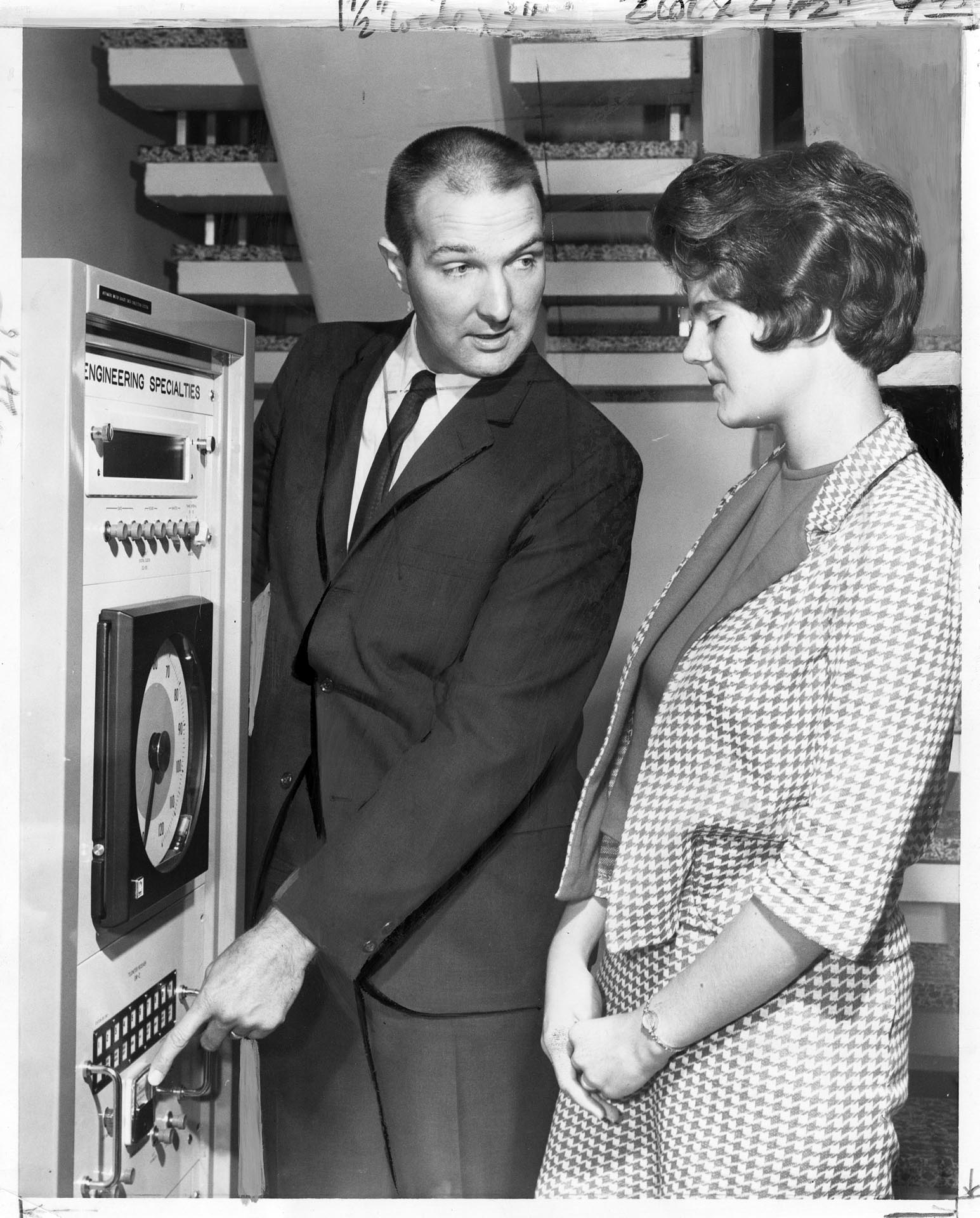 Image of Tom Gibbs and Molly Boone checking water monitoring system, Seattle, August 31, 1963