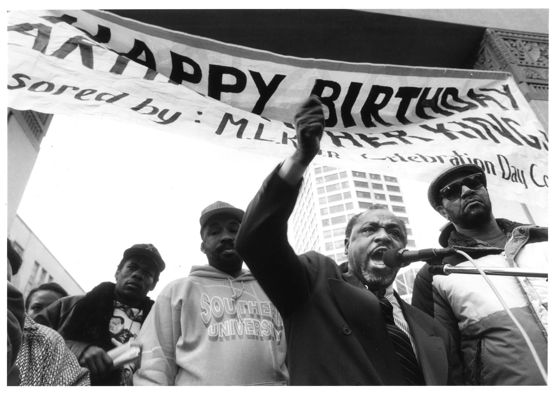 Image of Rev. Robert Jeffrey speaking at Martin Luther King Jr. day march, January 17, 1994