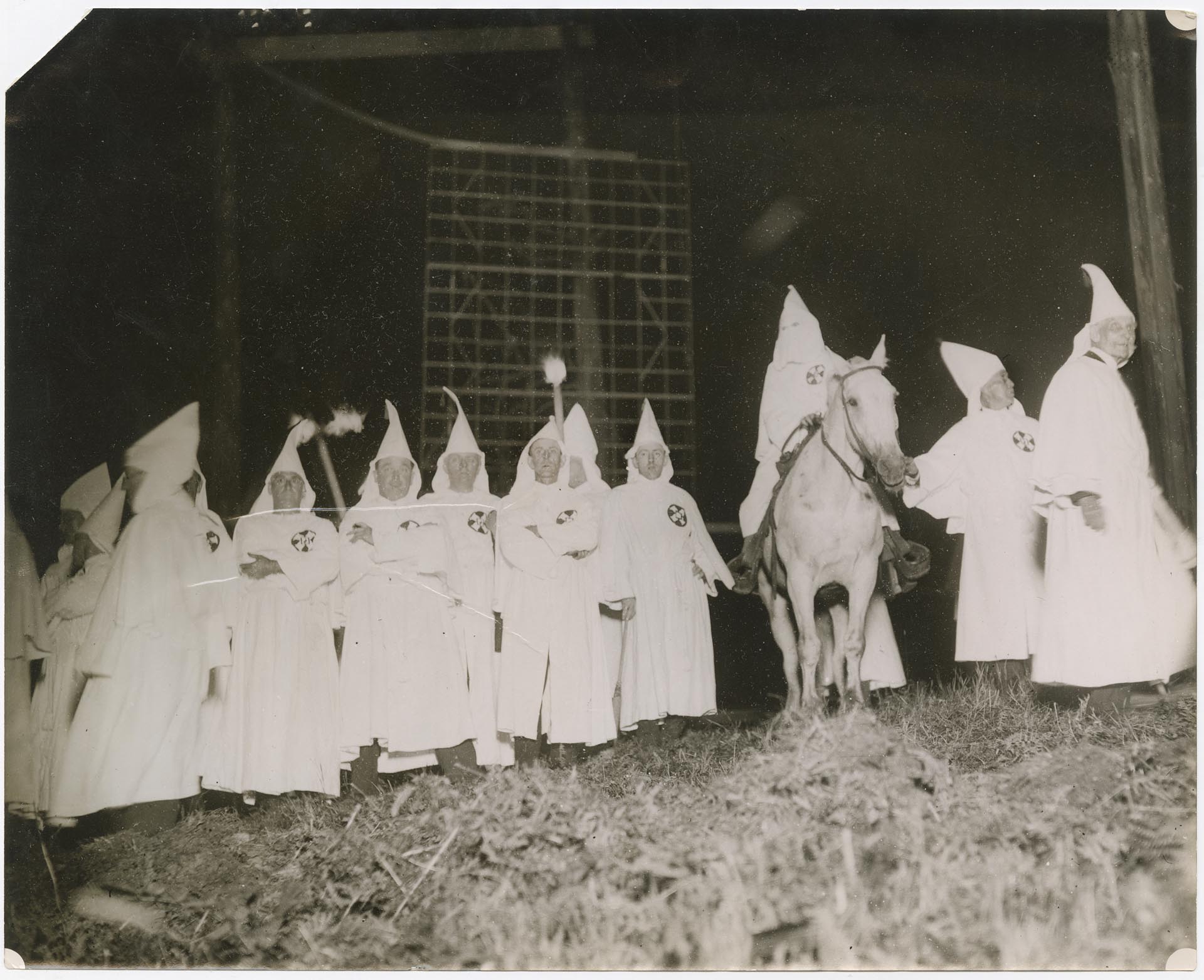Image of Klansmen at initiation ceremony at Wilson Station, Renton, July 14, 1923