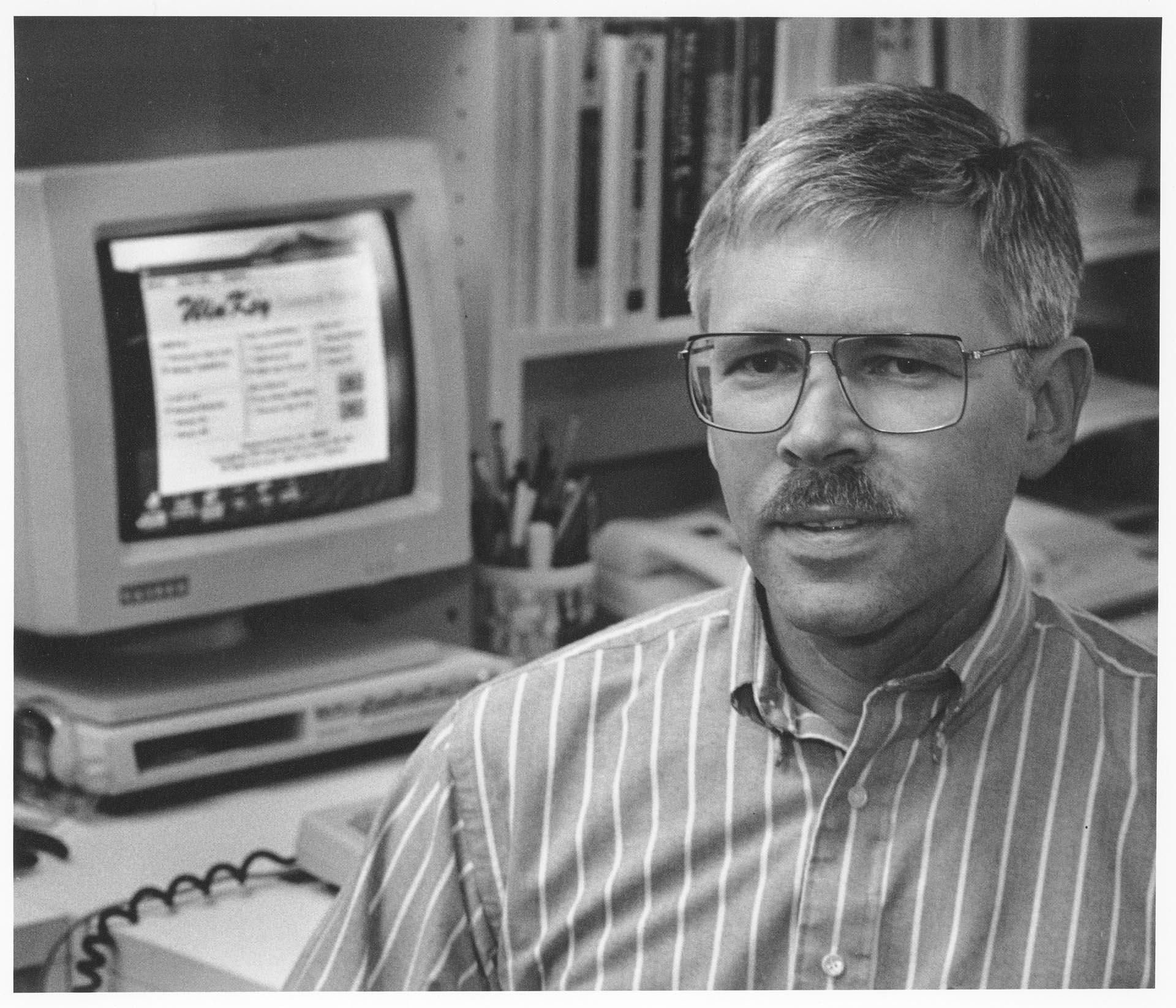 Image of Terry Lindeman of DataGem at computer, January 13, 1993