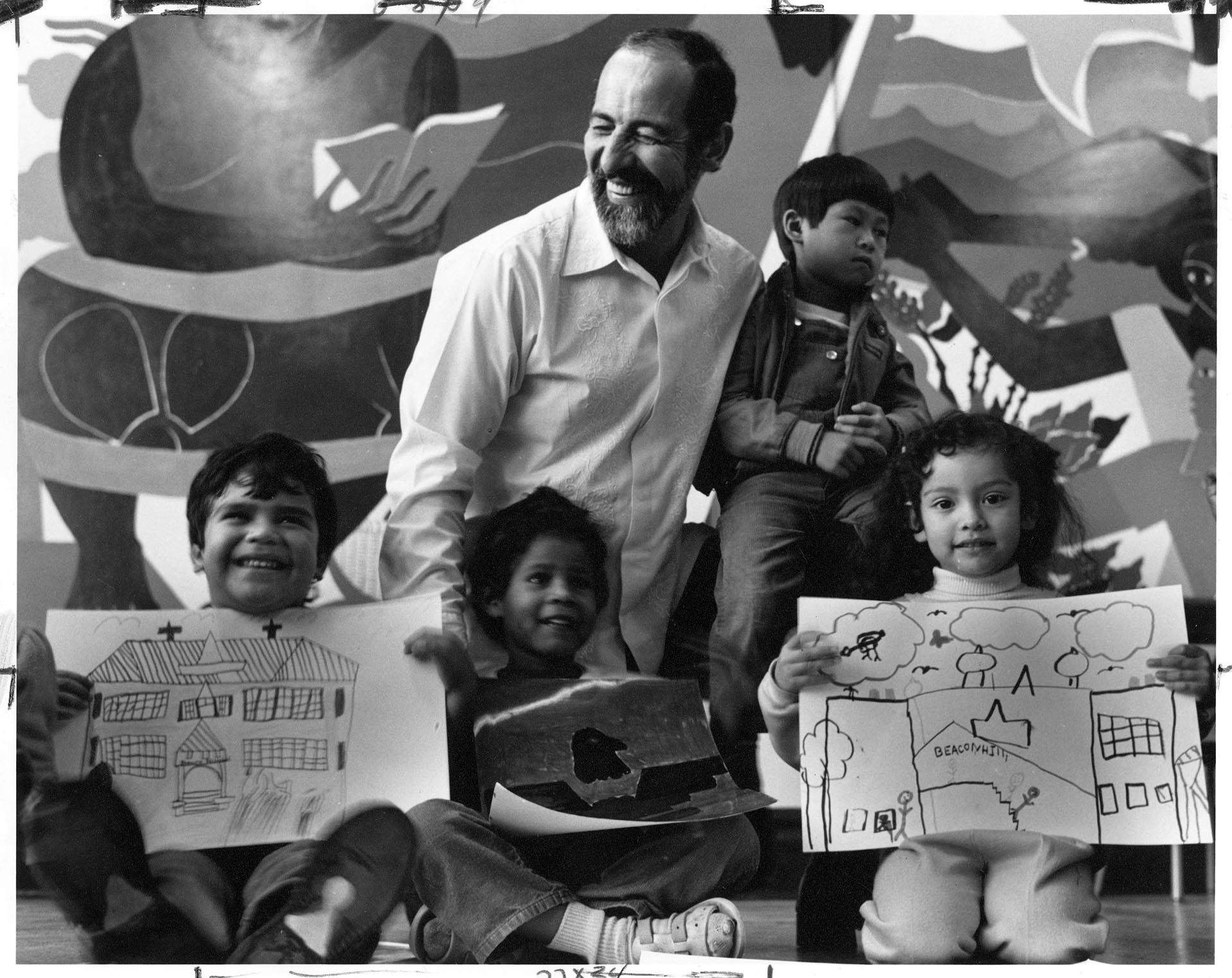 Image of Roberto Maestas with children at El Centro de la Raza, Seattle, October 22, 1987