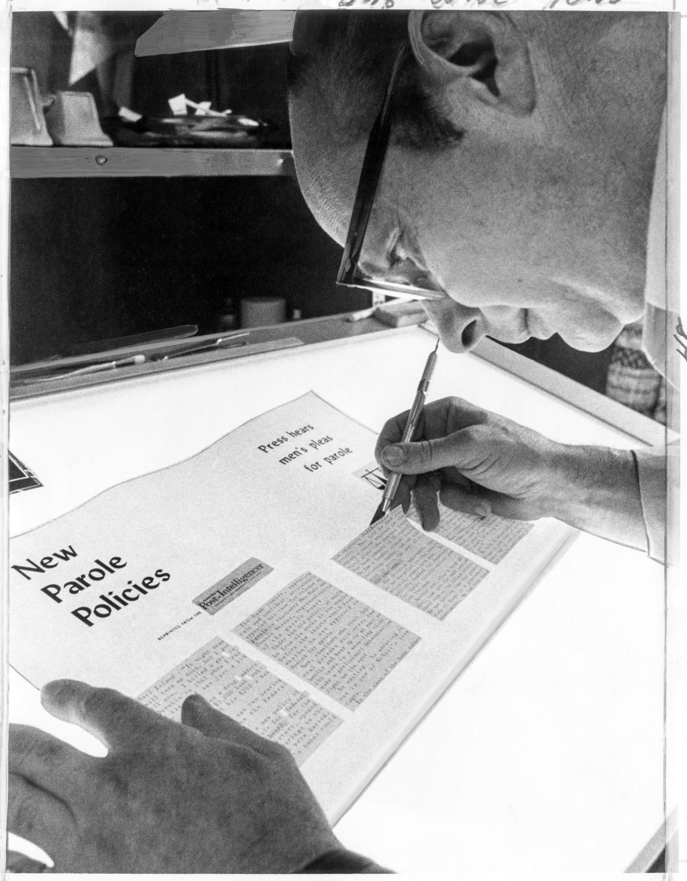 Image of Chuck McClellan working on magazine at McNeil Island Penitentiary, January 3, 1975