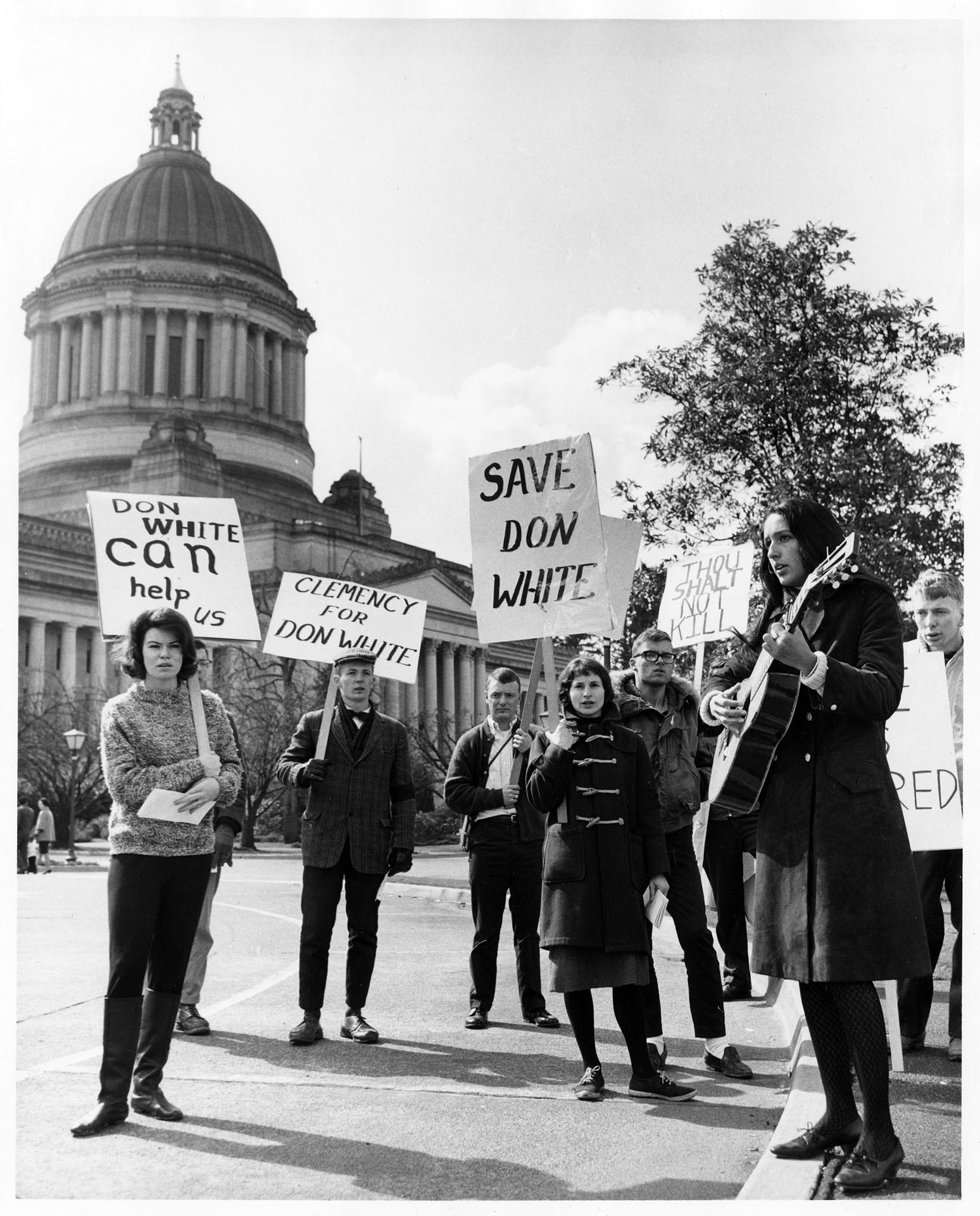 Image of Supporters for clemency for Don White holding picket signs, Olympia, March 23, 1964