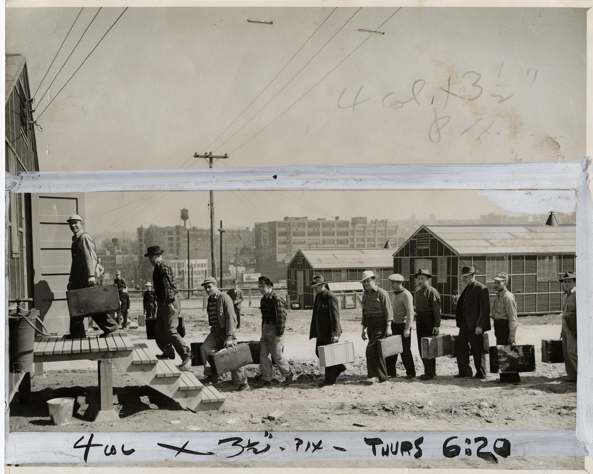 Image of Civilian workers moving into Denny Regrade Transient Camp, Seattle, April 13, 1943