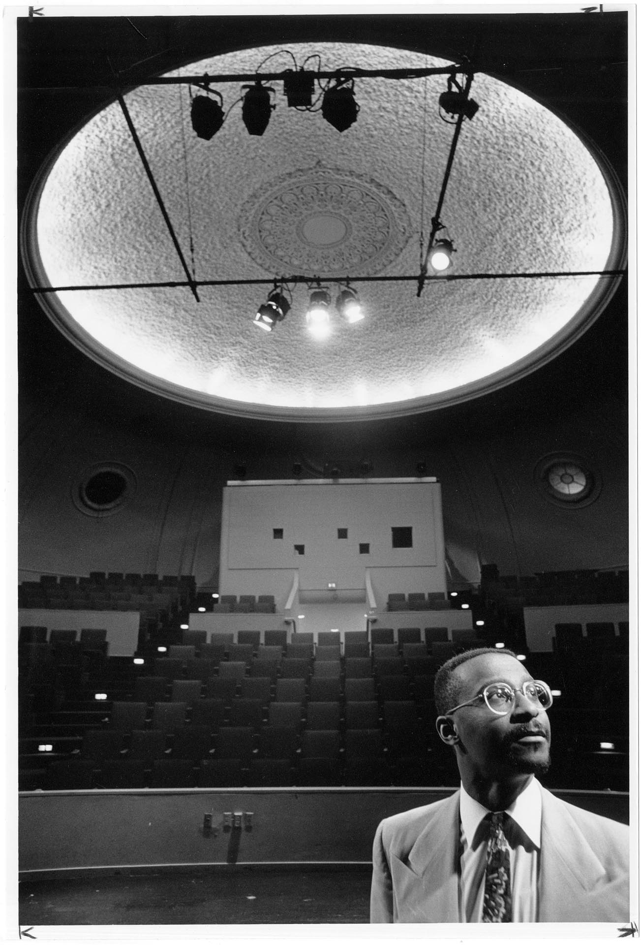 Image of Steve Sneed viewing restoration at Langston Hughes Cultural Arts Center, Seattle, April 11, 1993