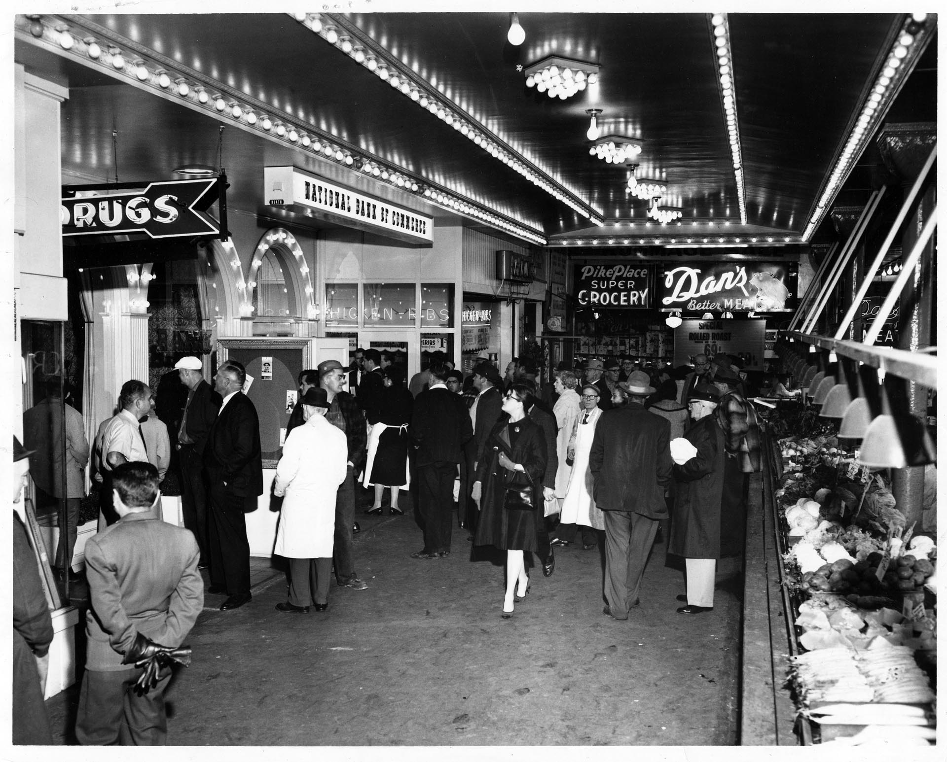 Image of Crowd gathered after bank robbery at Pike Place Market, Seattle, November 6, 1964