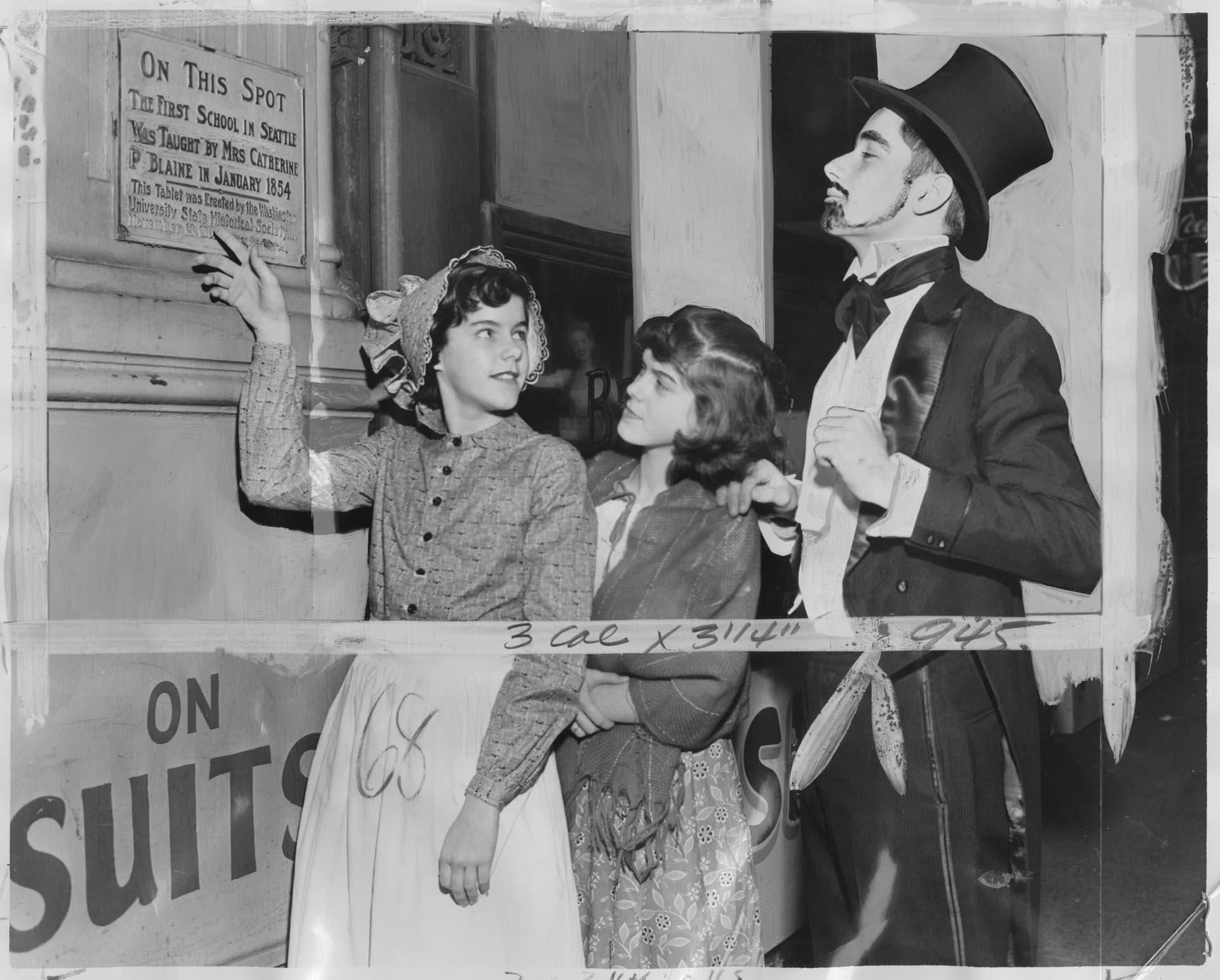 Image of Blaine School students in costume viewing Catharine Blaine plaque, Seattle, January 12, 1954