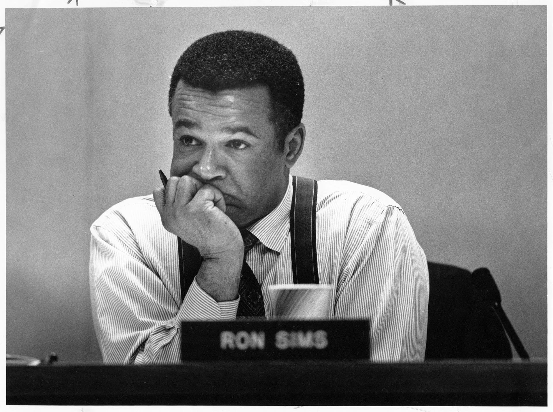 Image of Ron Sims listening to testimony at King County Council meeting, Seattle, March 13, 1992