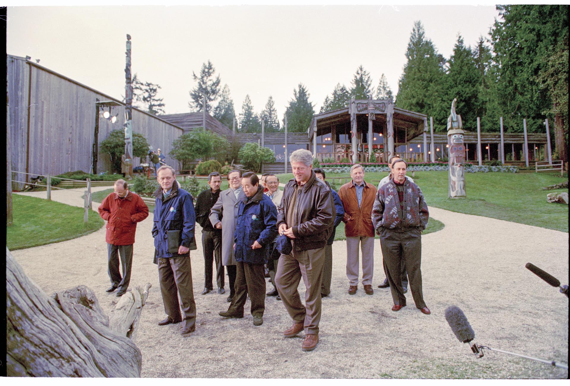 Image of APEC conference attendees standing together at Tillicum Village, Blake Island, November 20, 1993