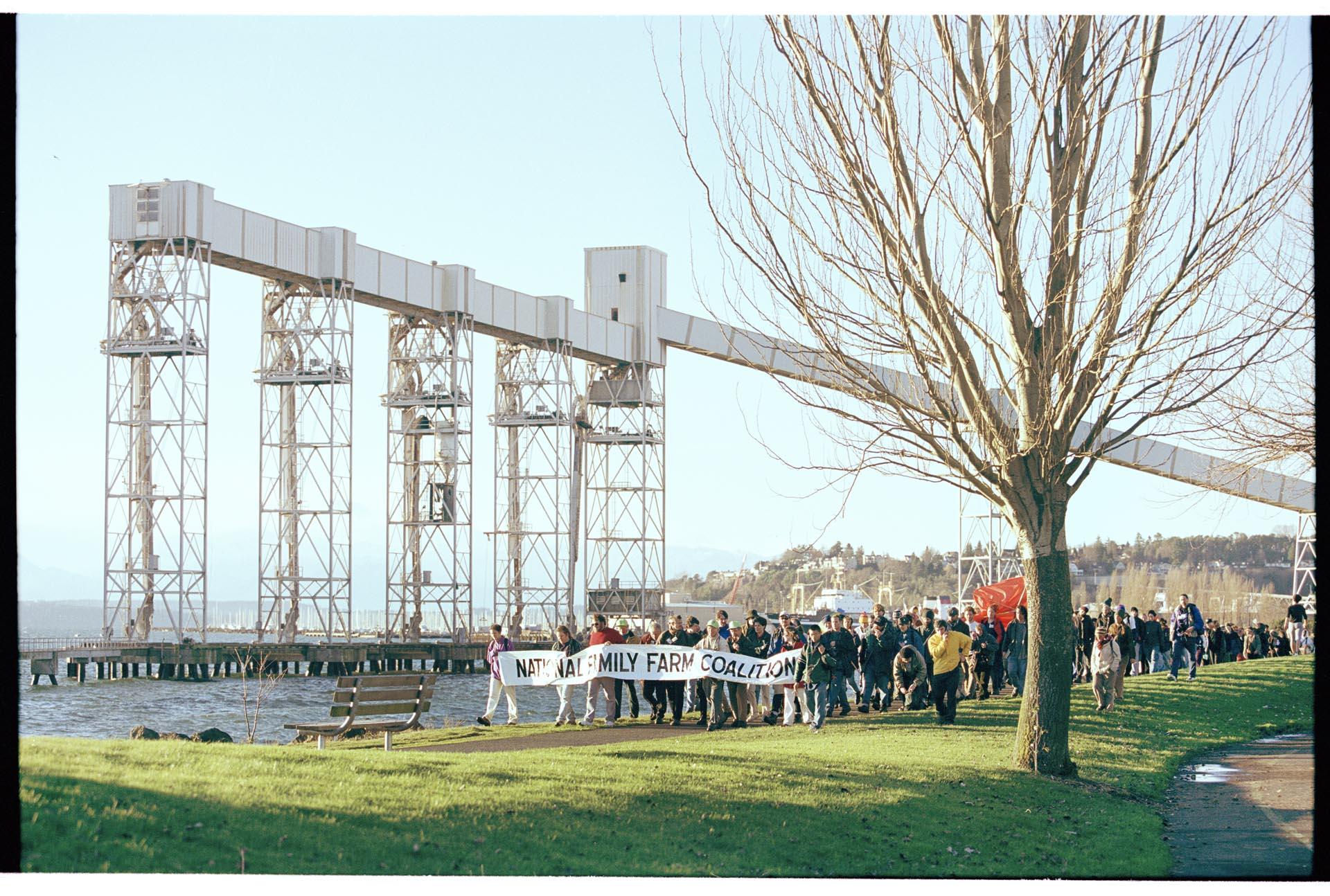 Image of National Family Farm Coalition march at Pier 86 Grain Terminal, Seattle, December 2, 1999
