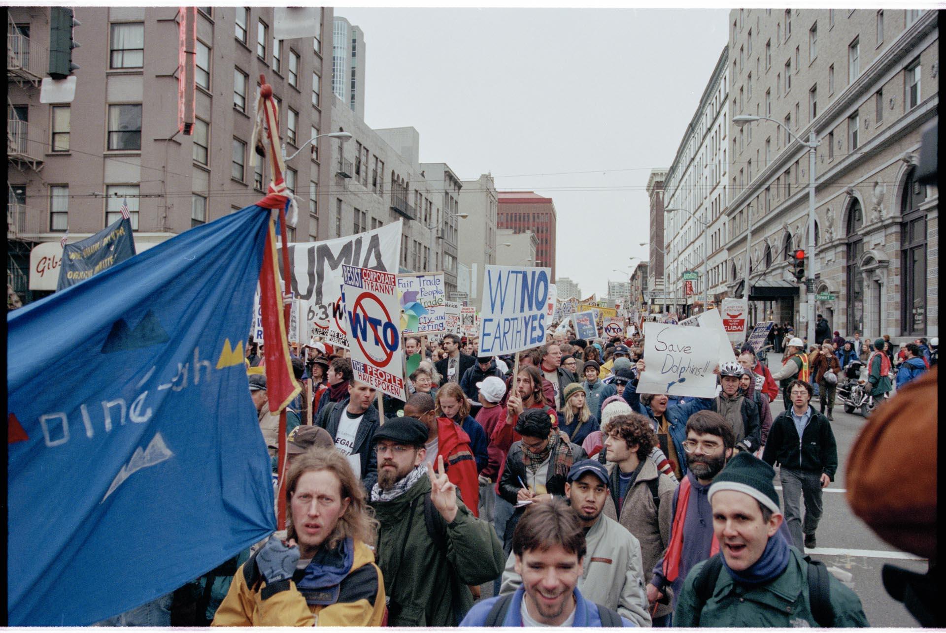 Image of Demonstrators marching at WTO protest, Seattle, December 3, 1999