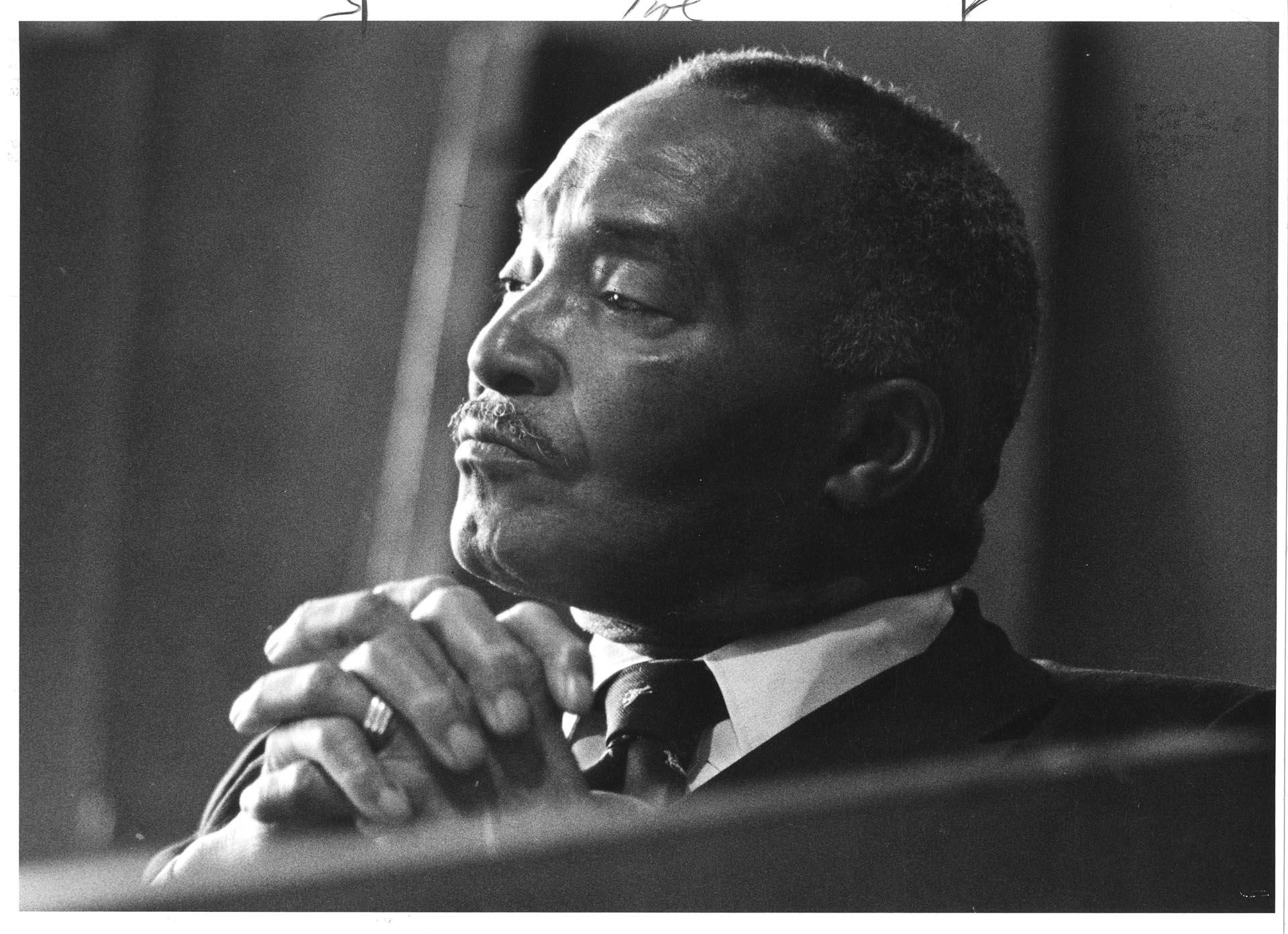 Image of Sam Smith listening to demonstrators, June 20, 1983