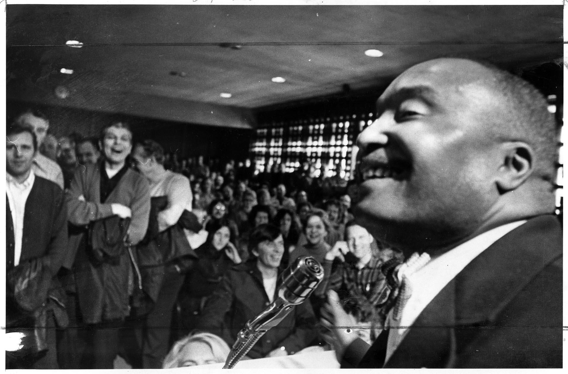 Image of Sam Smith with protesting City Light employees in council chambers, April 11, 1974