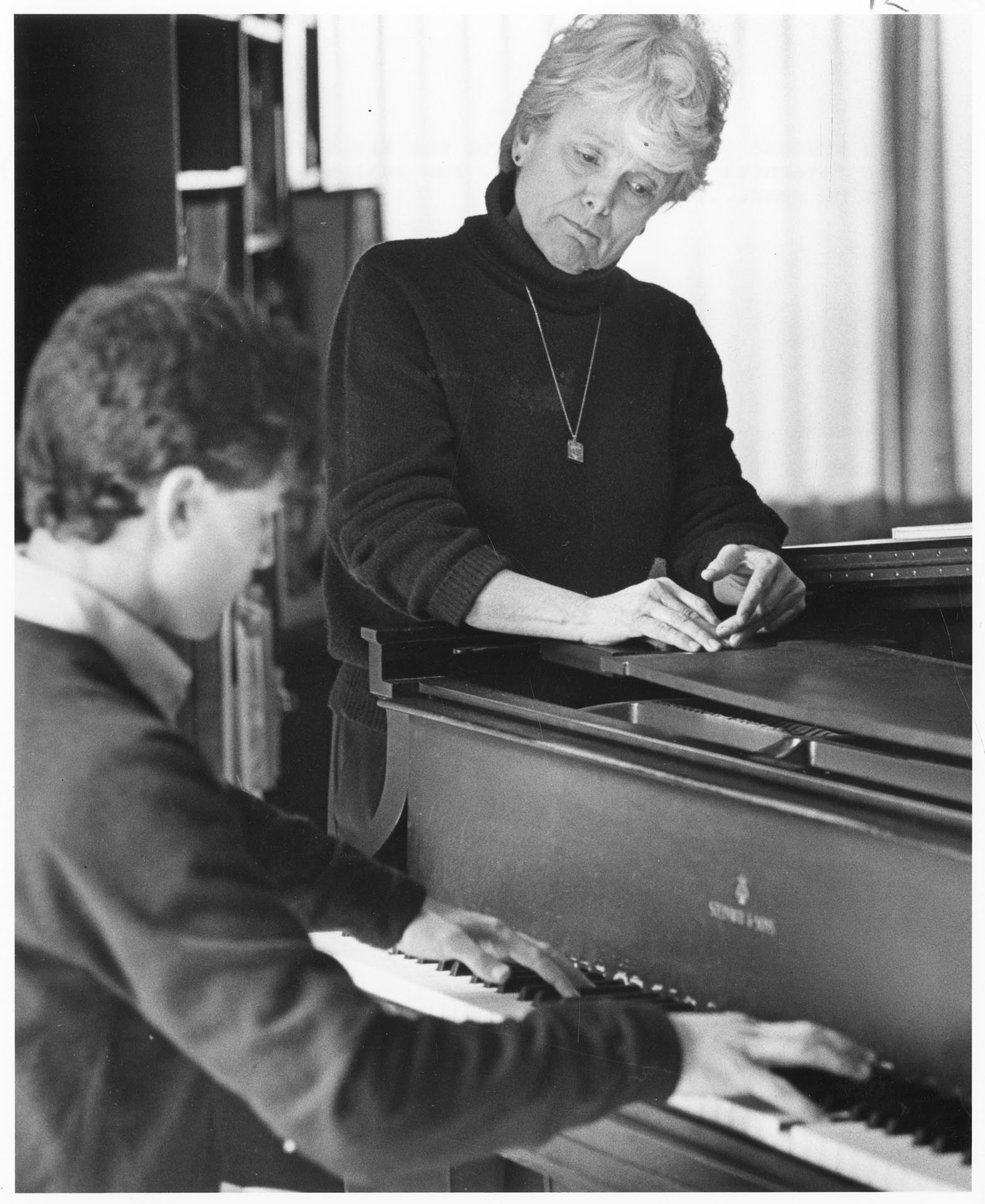 Image of Helen Taverniti with her piano student, Seattle, March 28, 1984