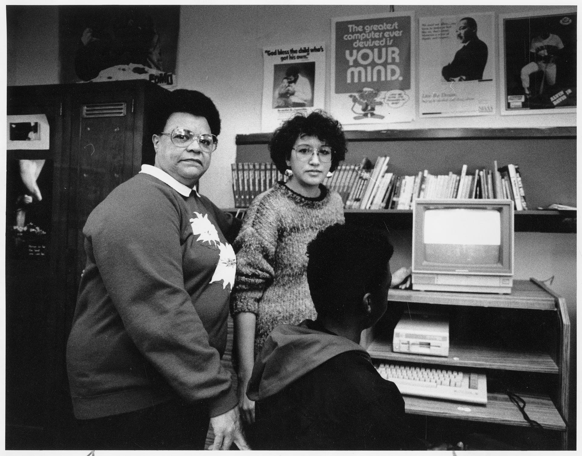 Image of Bettylou Valentine and Rebecca Salinas-Burton with student in Central Youth and Family Services office, Seattle, January 2, 1990