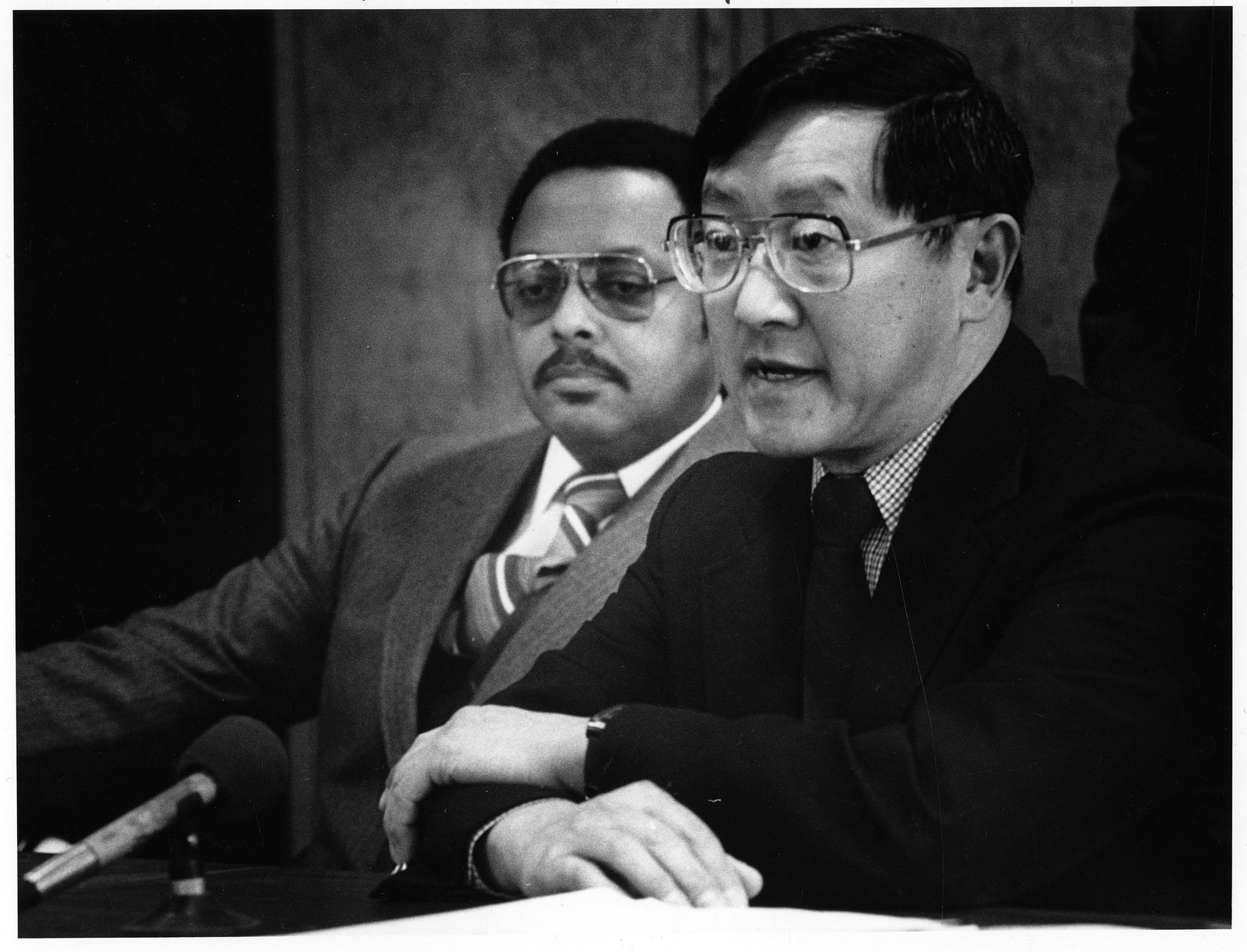 Image of Ben Woo and Bruce Terry speaking about low-income housing plans, Seattle, January 30, 1984